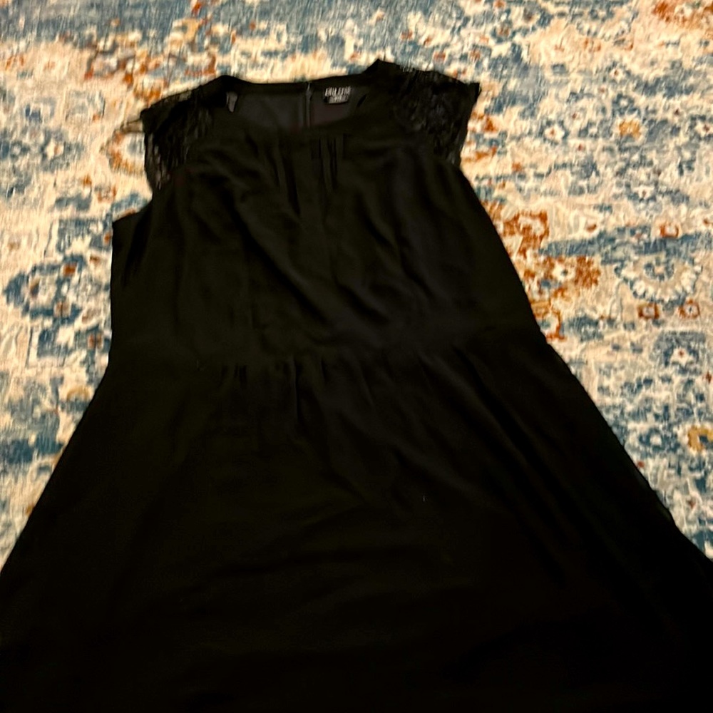 A gorgeous black dress with lacey short sleeves